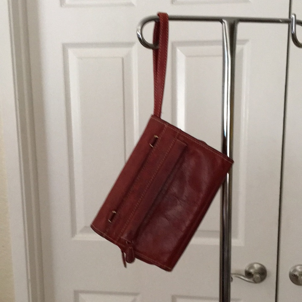 Chaos Leather Collection wristlet. Maroon.